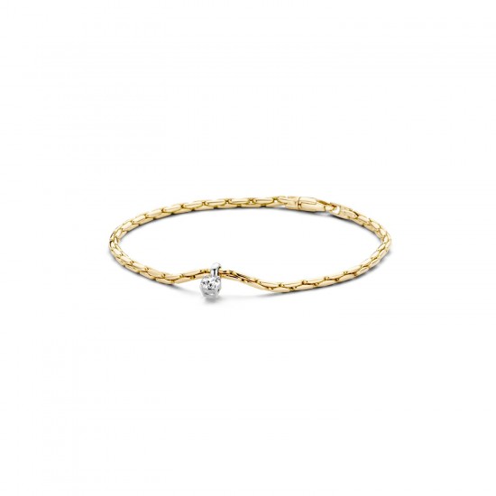 SIERADEN - Deze armband heeft een bijzondere uitstraling door de combinatie gepolijste 14k geelgouden schakels en de witgouden chaton-zetting met een briljant geslepen zirkonia. De armband heeft een lengte van 18