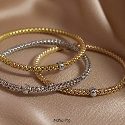 STELLA MILANO 1233-A GEEL 18 KT. GEELGOUDEN ARMBAND MET REKBARE KERN