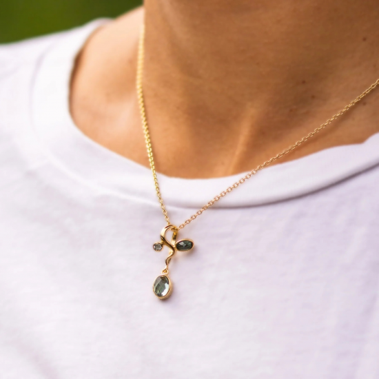 RABINOVICH 82702351 VERGULD ZILVEREN COLLIER MET HANGER MET BLAUWE KWARTS EN TOPAAS BLEND OF BLUE