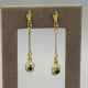 Verfijnde 14k Gouden Oorhangers met Blauwe Saffier
