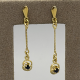 Verfijnde 14k Gouden Oorhangers met Blauwe Saffier