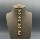 14 Karaat Bicolor Gouden Schakelarmband met Rozen